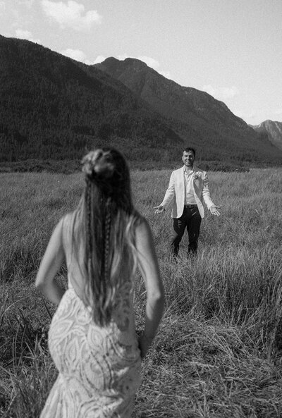 Bride running to her groom in Pitt Meadows British Columbia