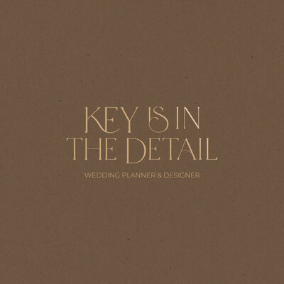 Brown textured background with Key is in the Detail logo