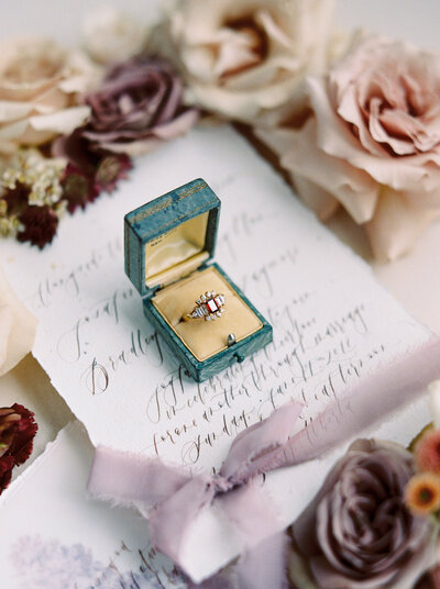 Engagement ring in teal velvet ringbox