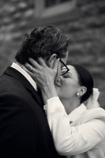 a man and woman kissing in providence rhode island for their engagement photography session