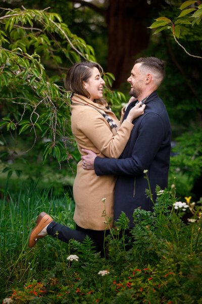 Couple engagement portraits in golden gate park san francisco laughing and smiling, photo by Anastasiya Photography - San Francisco Photographer