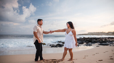 Couple dancing on Shipwreck Beach