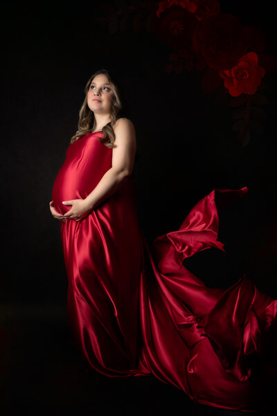 Studio Maternity Photo wit red wardrobe