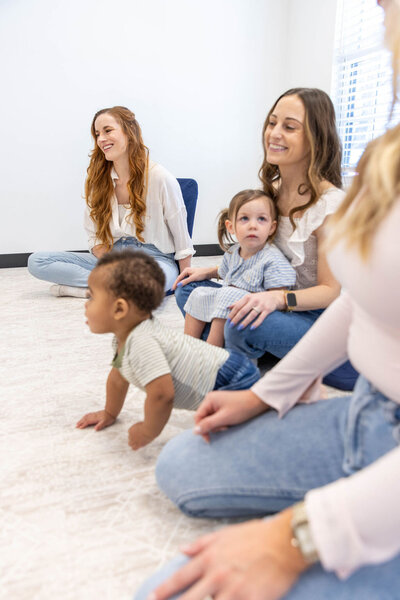 Group of women on a play date with their babies