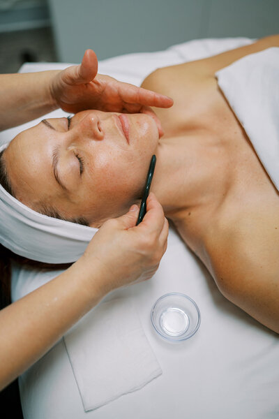 Woman receiving nano infusion facial Charlotte NC