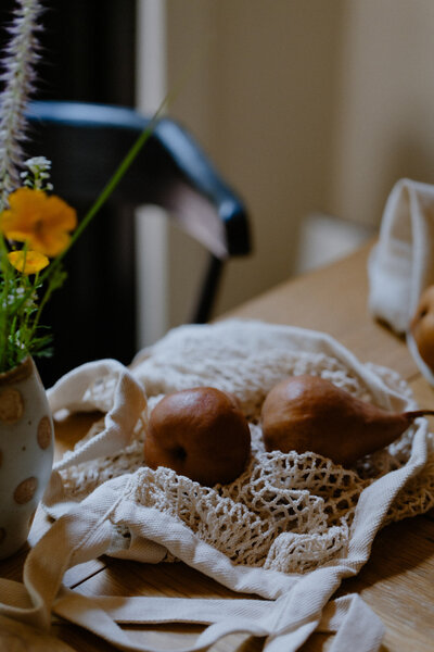 Pears sitting on the kitchen table