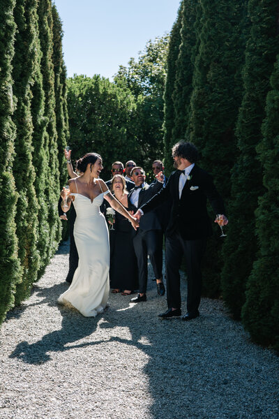 Bride and groom walk up memorial steps at their DC wedding