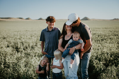 Family and engagement photography in Circle, MT, showcasing intimate moments in the stunning Montana countryside, perfect for couples and families looking to capture lifelong memories.