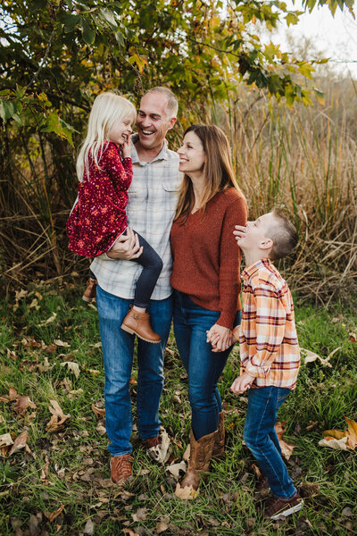 Family of four at a family photoshoot