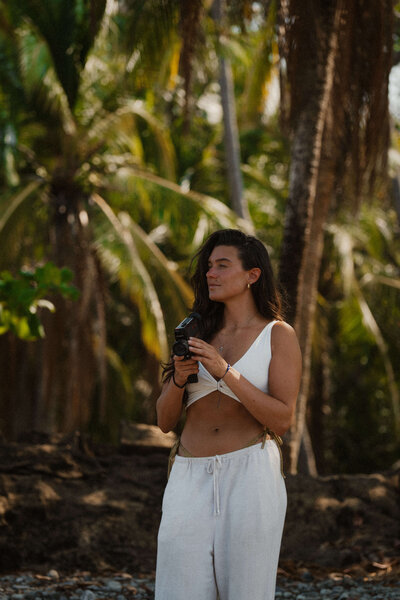 Girl holding film camera