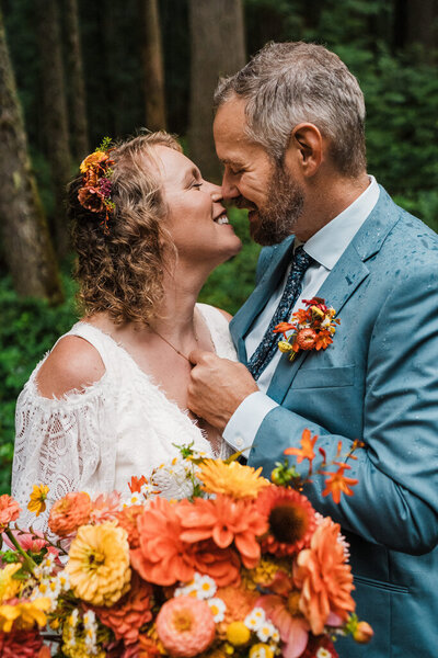 a bride and groom soak in the moment during their elopement in leavenworth photographed by adventure elopement photographer amy galbraith