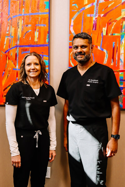 Jami Schmidt and Mark Shashikant standing side by side