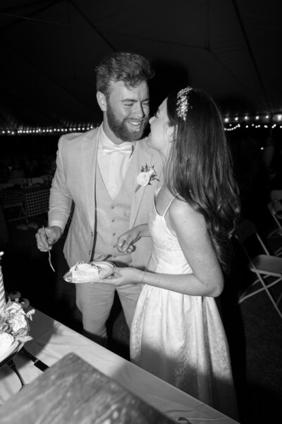 couple cutting their wedding cake