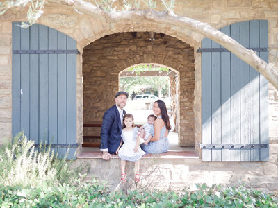 outdoor family photoshoot with newborn and toddler at the park