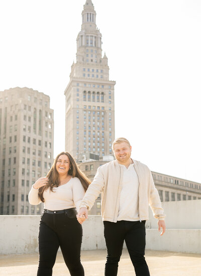 candid rooftop engagement photos by top Ohio couples and wedding photographer
