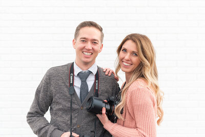 husband and wife wedding photographer team