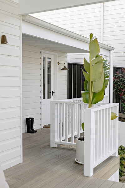 jesse-mccabe-granny-flat-renovation-exterior-deck-palm-tree-kahibah-nsw
