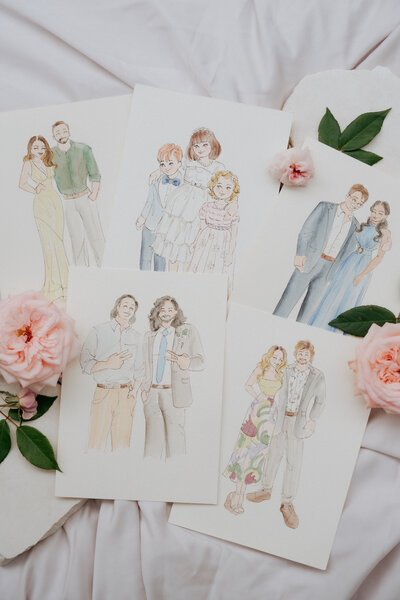 flat-lay-of-live-guest-portraits-custom-wedding-favours