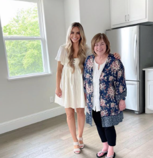 Owner Erin with a lady IG post in a kitchen