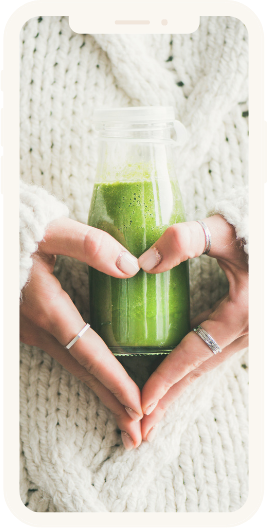 Woman holding smoothie