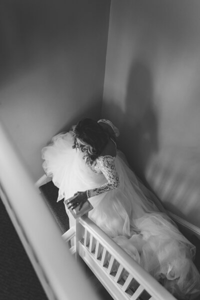 Bride walking down stairs photographed by Wichita Wedding Photographer, The Cantrells