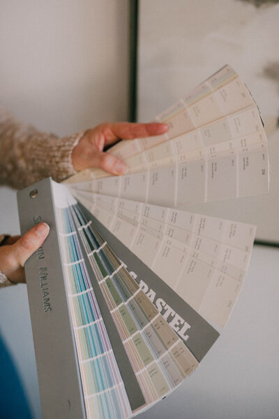 Vacant home staged by Modern Mollusk in Snohomish County featuring styled wood cabinetry, warm lighting, and neutral decor accents.