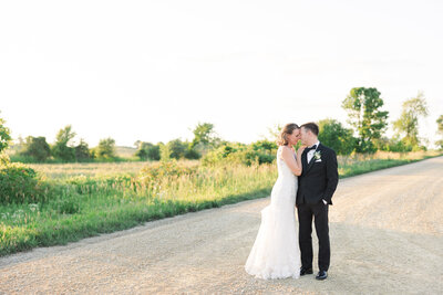 couple hold each other close taken by minneapolis wedding photographer
