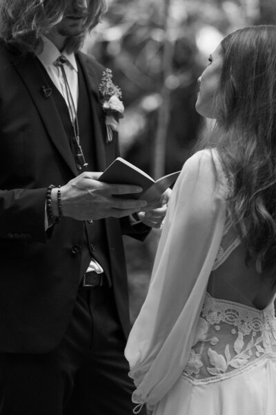 Wedding vows being ready at Jenner Elopement