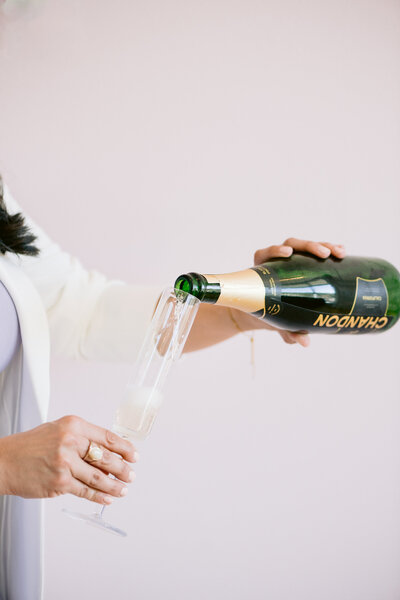pouring champagne