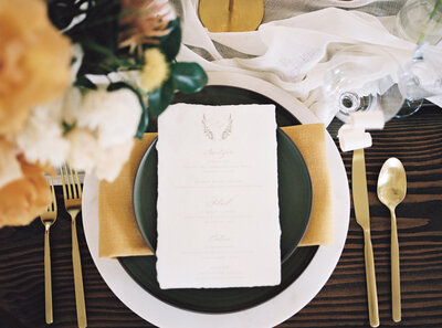 Elegant Wedding Place Setting and Menu with Green and Gold Accents