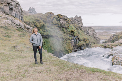 An Iceland elopement photographer smiling during a couple's elopement day in Southern Iceland