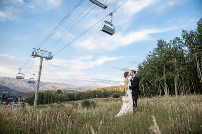 Beautiful bride and groom on their wedding day on Snowmass Mountain in Aspen, Colorado shot by Kelly Elizabeth Photography.