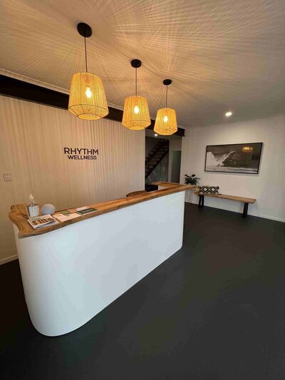 white reception desk at the studio