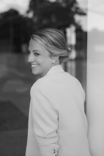 Head shot of Detroit Michigan wedding photographer​ Courtney Rudicel