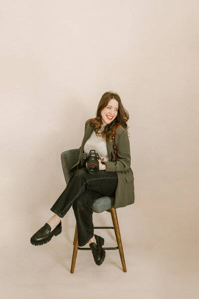 woman holding camera