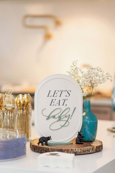 Custom table sign "Let's eat baby!"