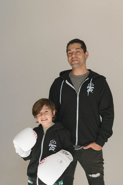 Man and son sporting Gloves for Grief apparel