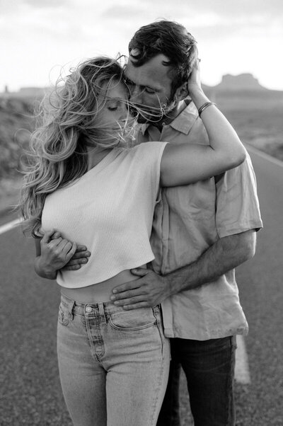 sweet-couple-in-black-white-nevada-mountain-landscape