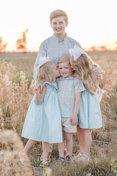 Set of four cousins posing for a photo -Newborn Photography Greenville SC