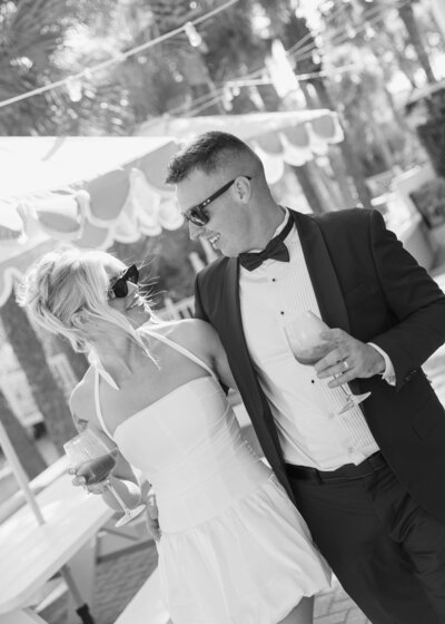 The bride walks with her dad to the ceremony space set in the beautiful gardens at the Bower Venue in Oklahoma City.