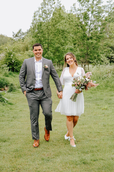 Newlyweds celebrating outside Bakewell Registry Office captured in natural light