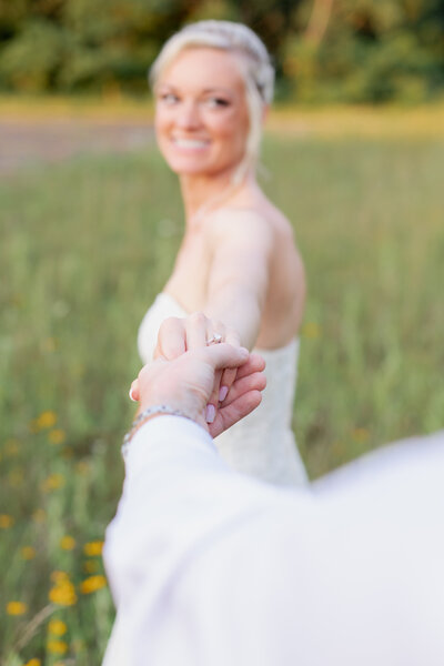 Bride looking back at groom