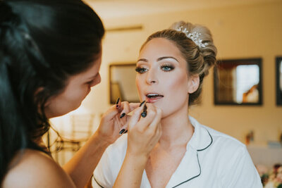 Bride in Boston getting her makeup done