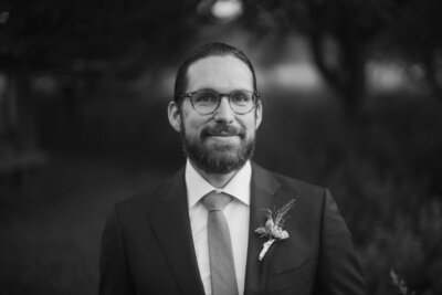 wedding photographer Adam smiling at camera