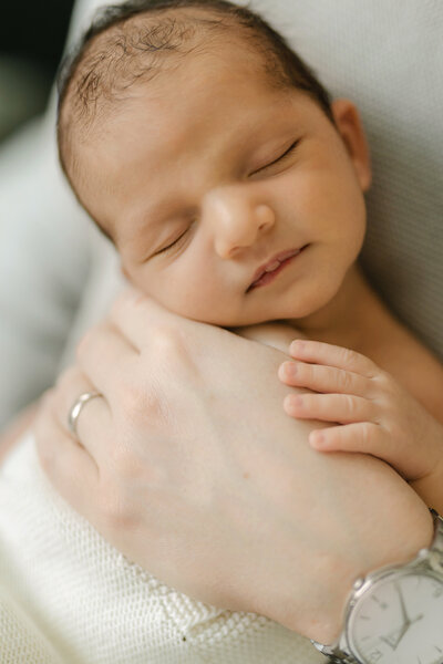 Sleeping newborn baby at toronto newborn session
