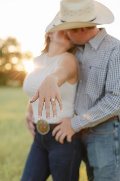 texas engagement session with couple kissing