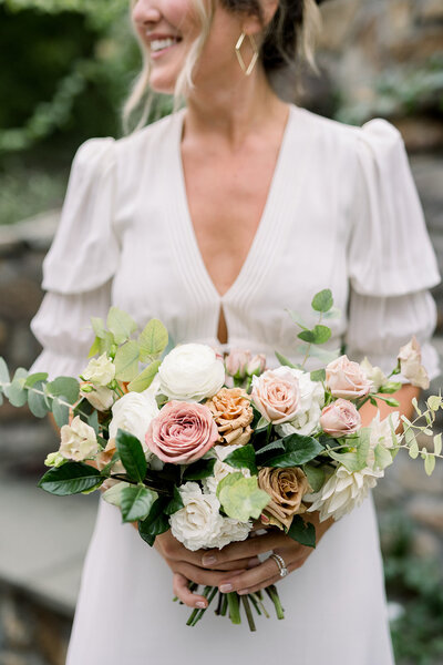 Kate Campbell floral september backyard elopement moody neutrals bouquet toffee cappuchino rose