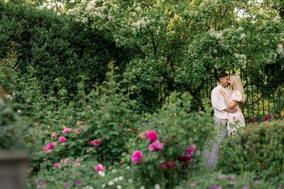couple sharing a hug during their engagement session at gardens at waterperry  farms in charlottesville