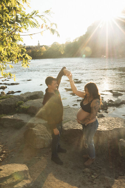 Expecting parents celebrating their pregnancy with a beautiful maternity portrait, captured by Ontario-based photographer Sarah Todd