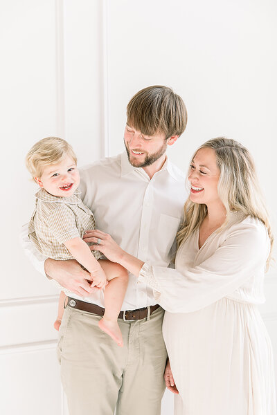 Family in studio during maternity session in Charlotte NC